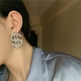 Icy 'Dollar Signs' Danglers